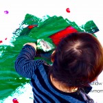 painting with brushes, balls and bodies