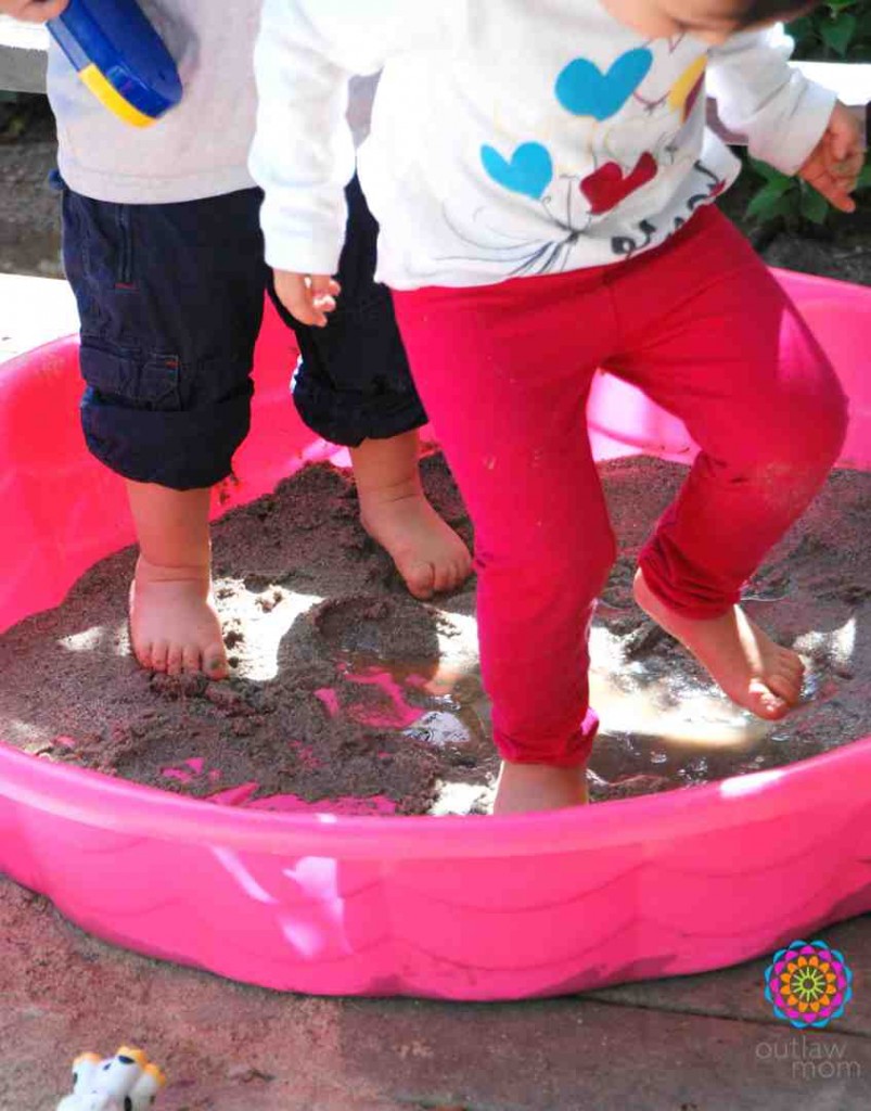 children's feet in mud