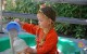 boy playing in sandbox